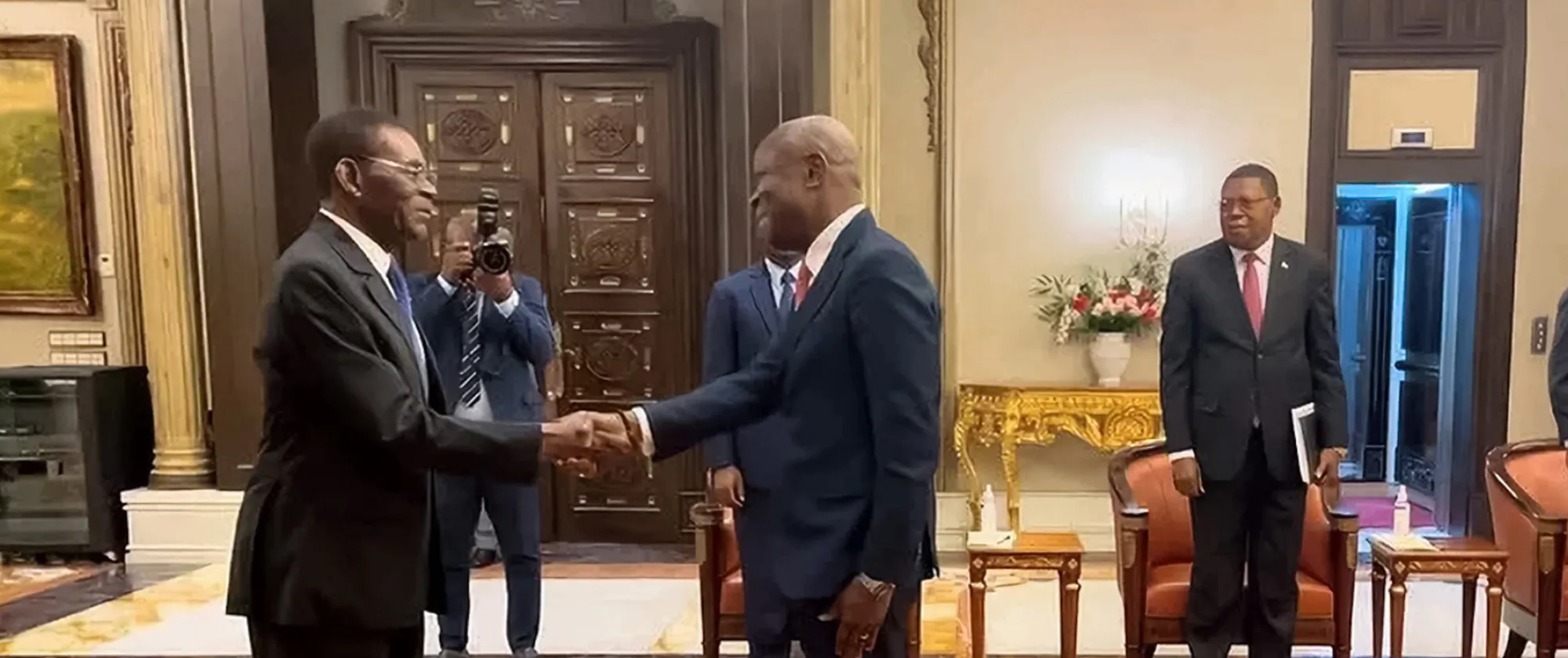 ILO Director-General Gilbert F. Houngbo shakes hands with the President of the Republic of Equatorial Guinea, Mr. Obiang Nguema