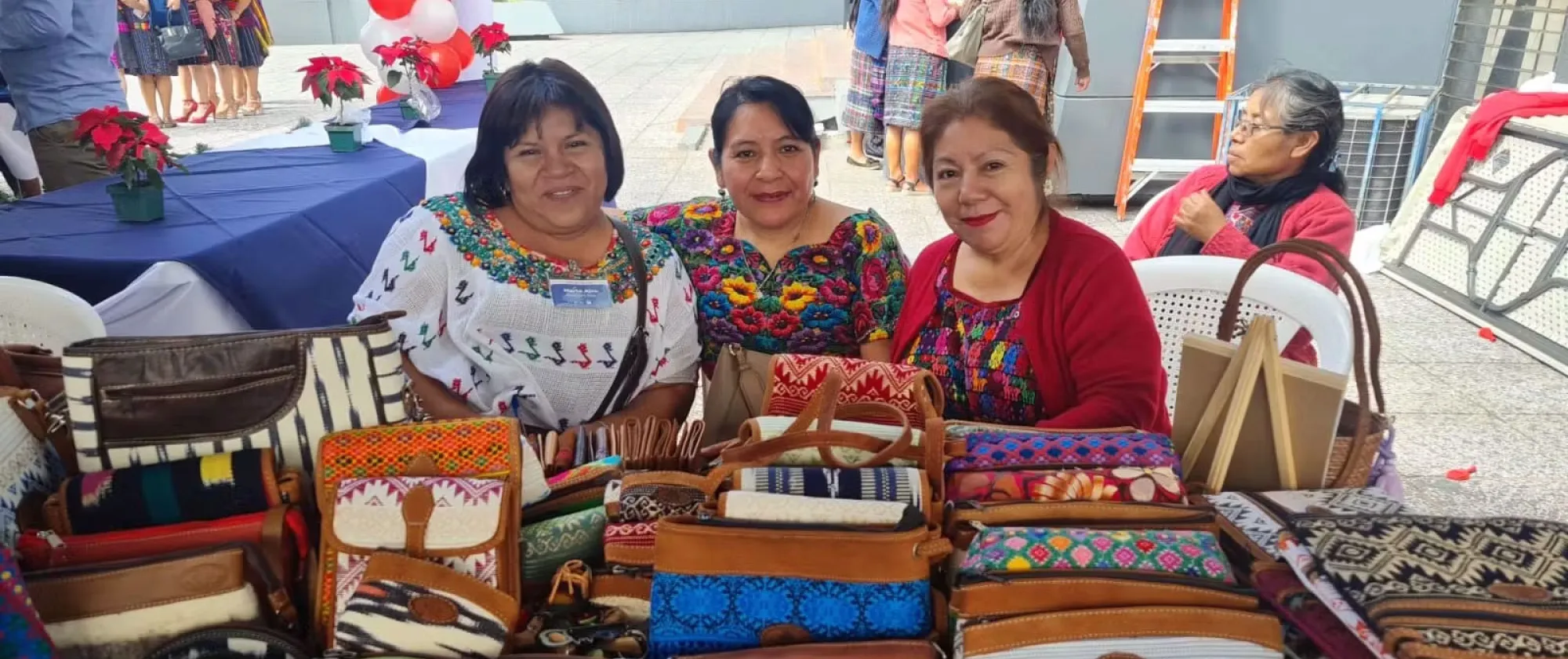 Indigenous women sell handycraft in Guatemala