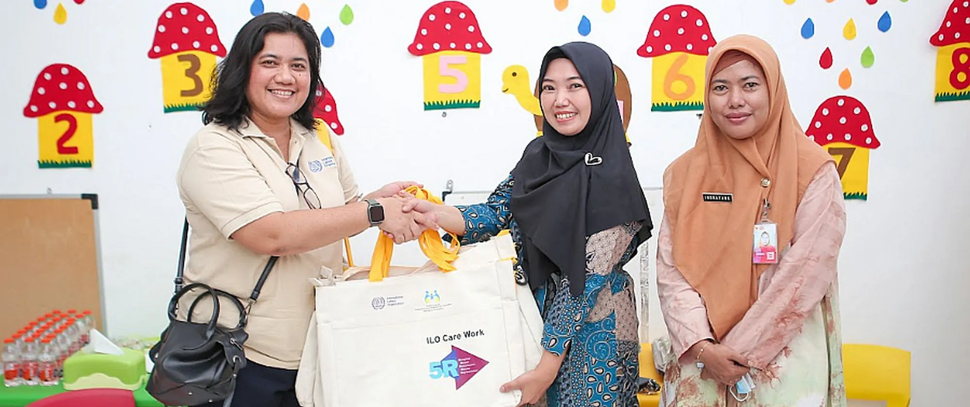 Early D. Nuriana, ILO’s Programme Coordinator for Care Economy visits a daycare in Surabaya, East Java, Indonesia.