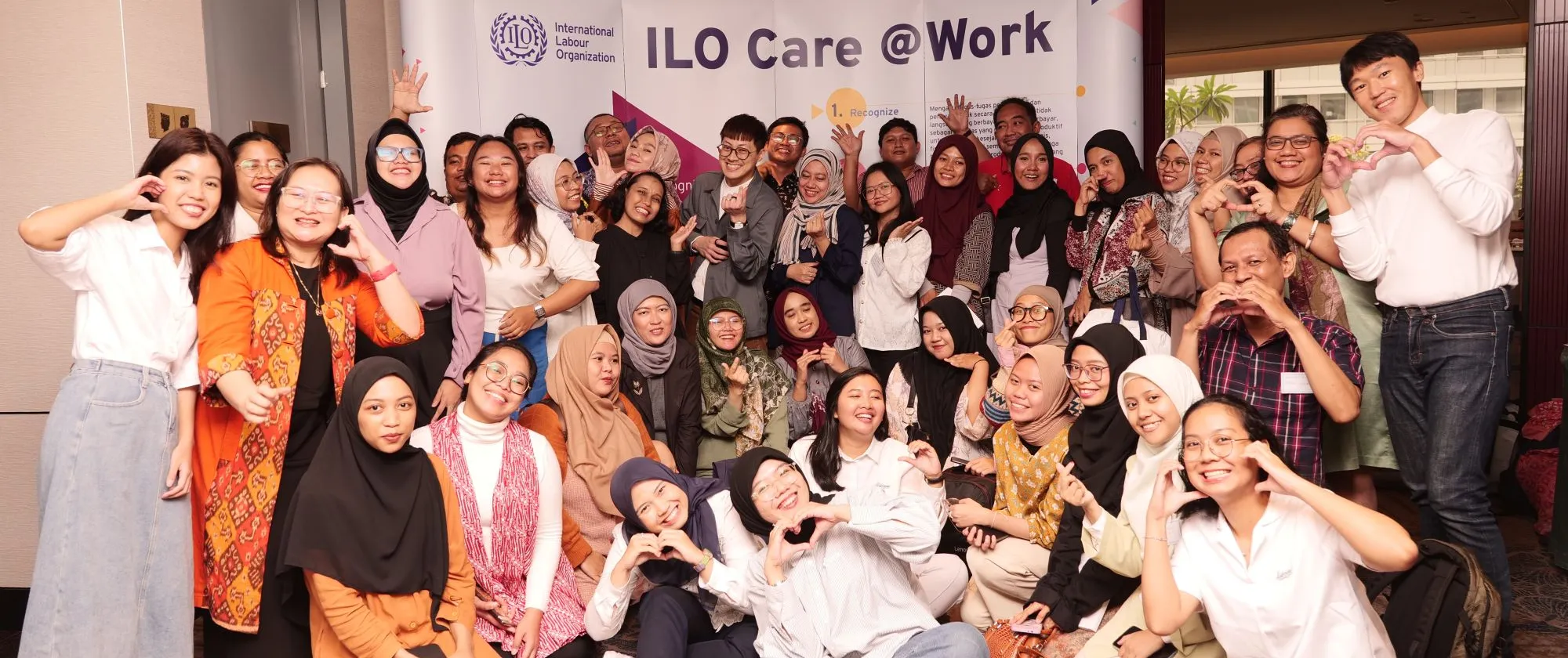 A group photo of ILO's social media training on care economy for influencers in Indonesia.