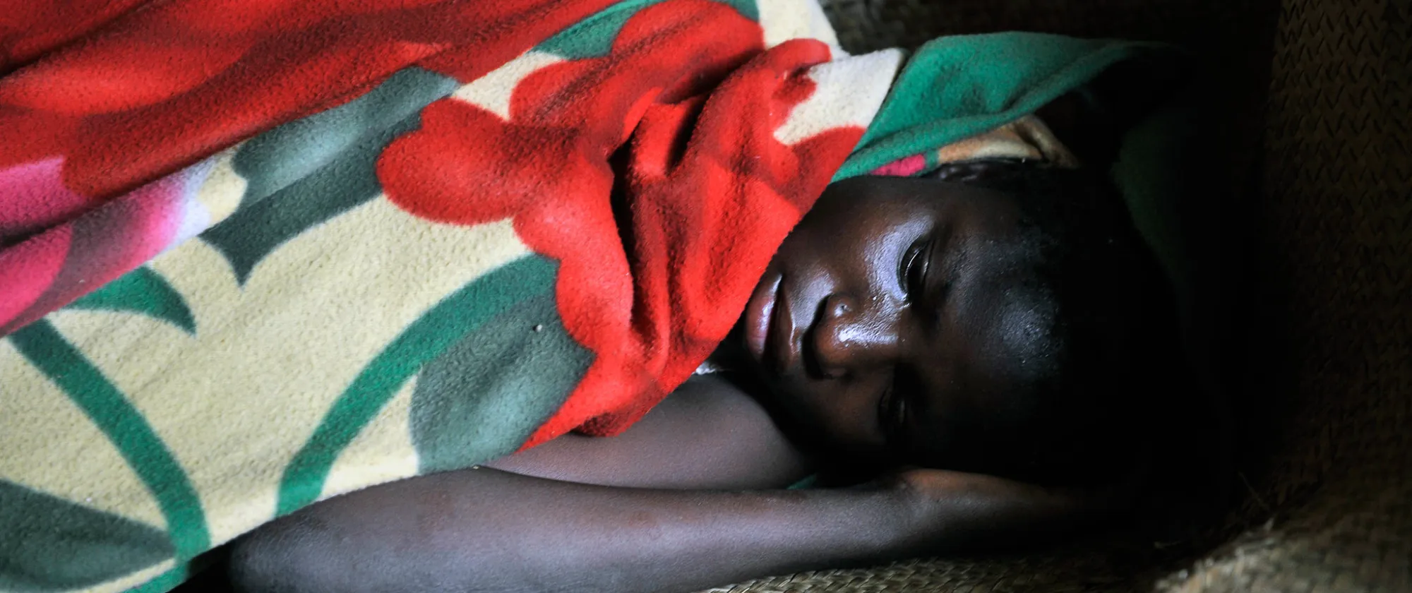sick young person under blanket. Mali