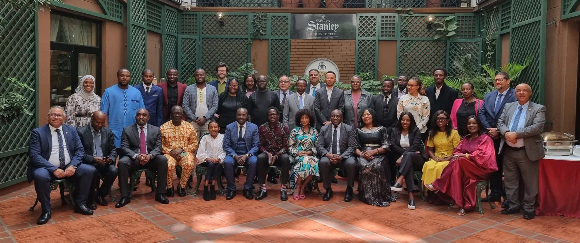 Government officials and social partner representatives of African ILO Member States stand for a group photo during the YES Africa validation meeting in Nairobi.