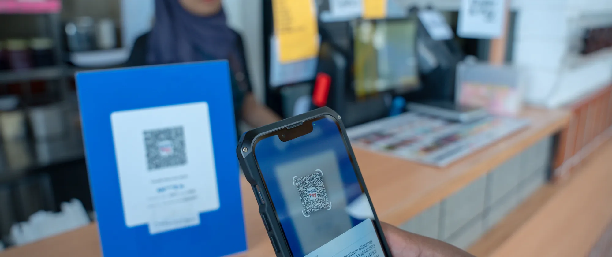 Digital payment using a QR code via a mobile device.