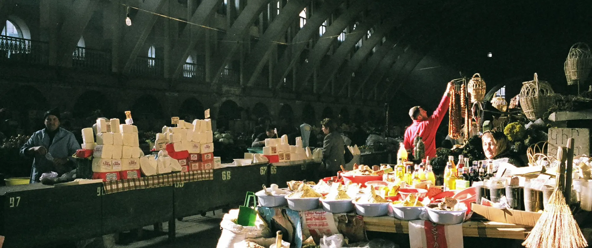 People selling goods in a market, Armenia.
