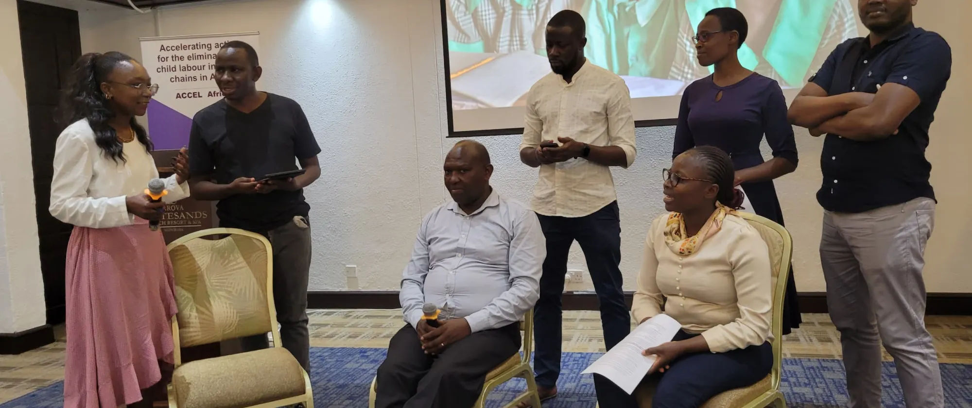 A group of trainees playrole an evaluation
