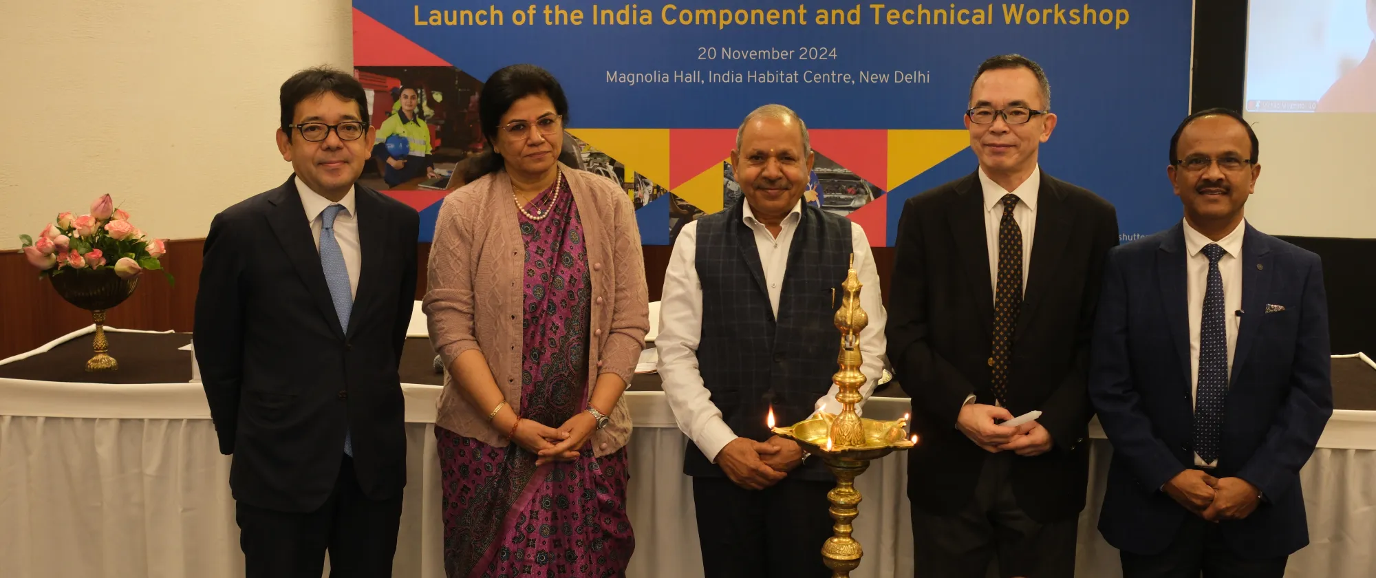 Panelists on the dais at the project launch event