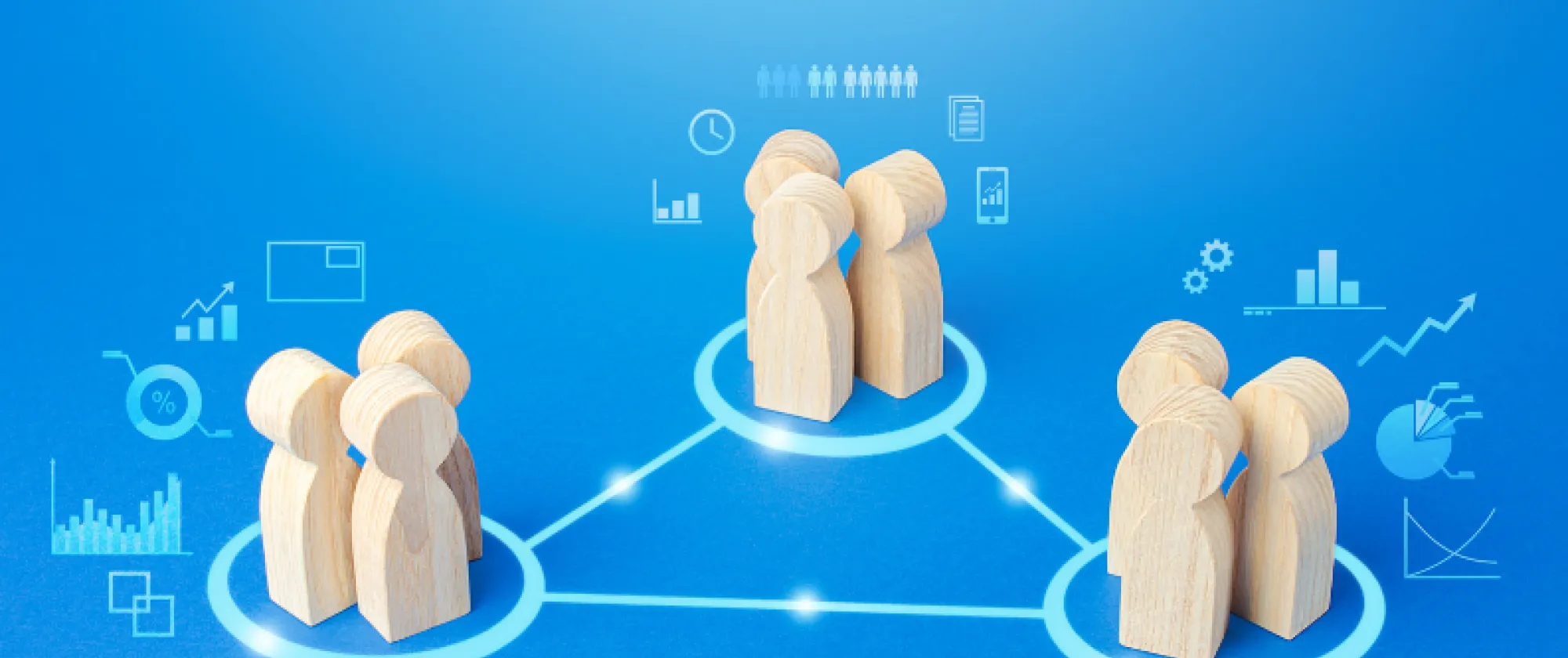 Image in blue background showing wood figures representing people and some icons representing data, which is linked with lines representing knowledge sharing.