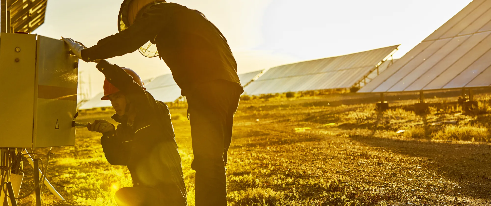 Engineers check solar photovoltaic.