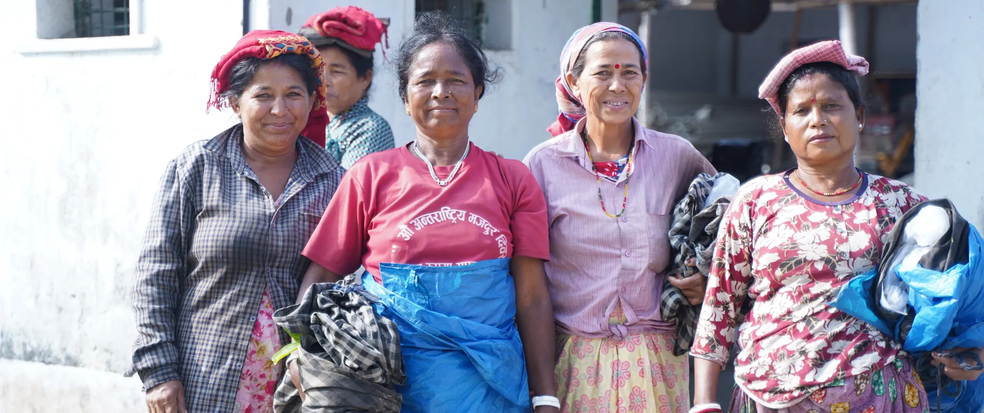 Group of women tea pluckers looking at the camera