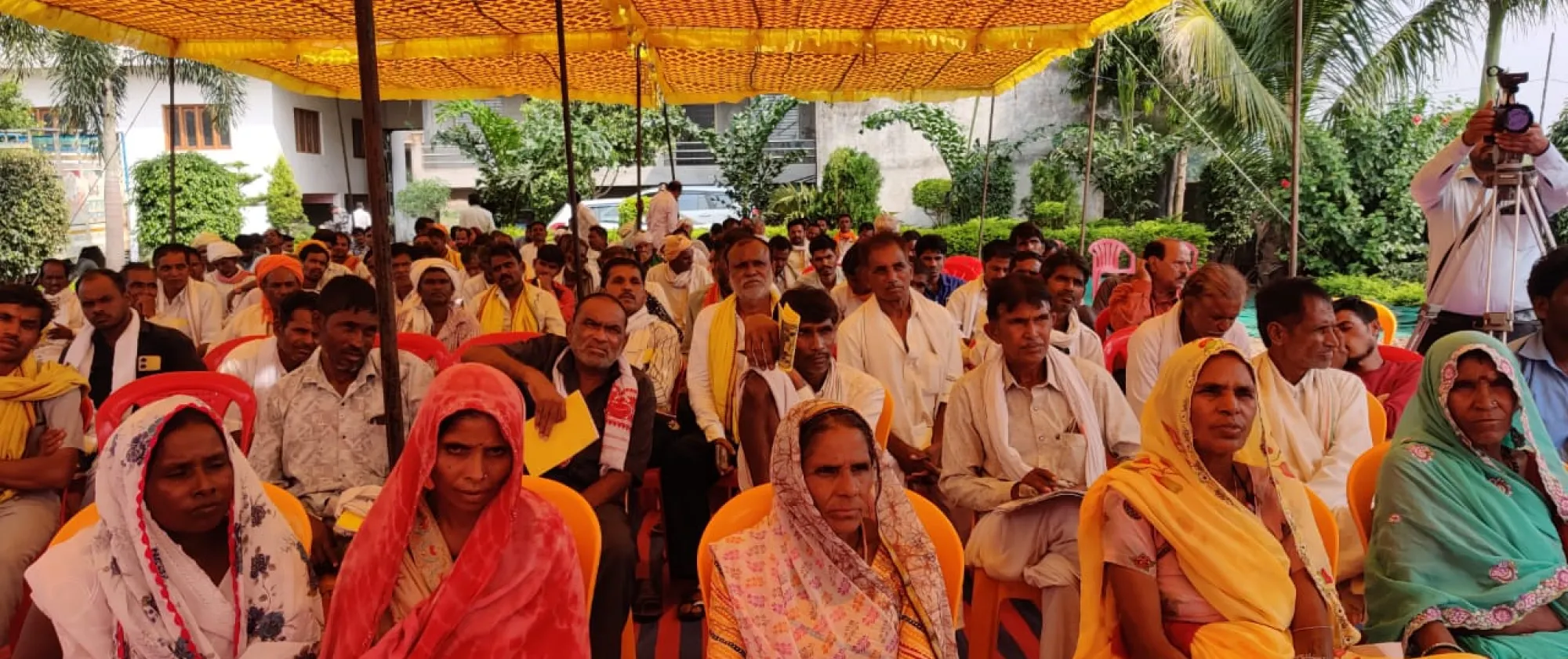 Women sitting together at a meeting in the village