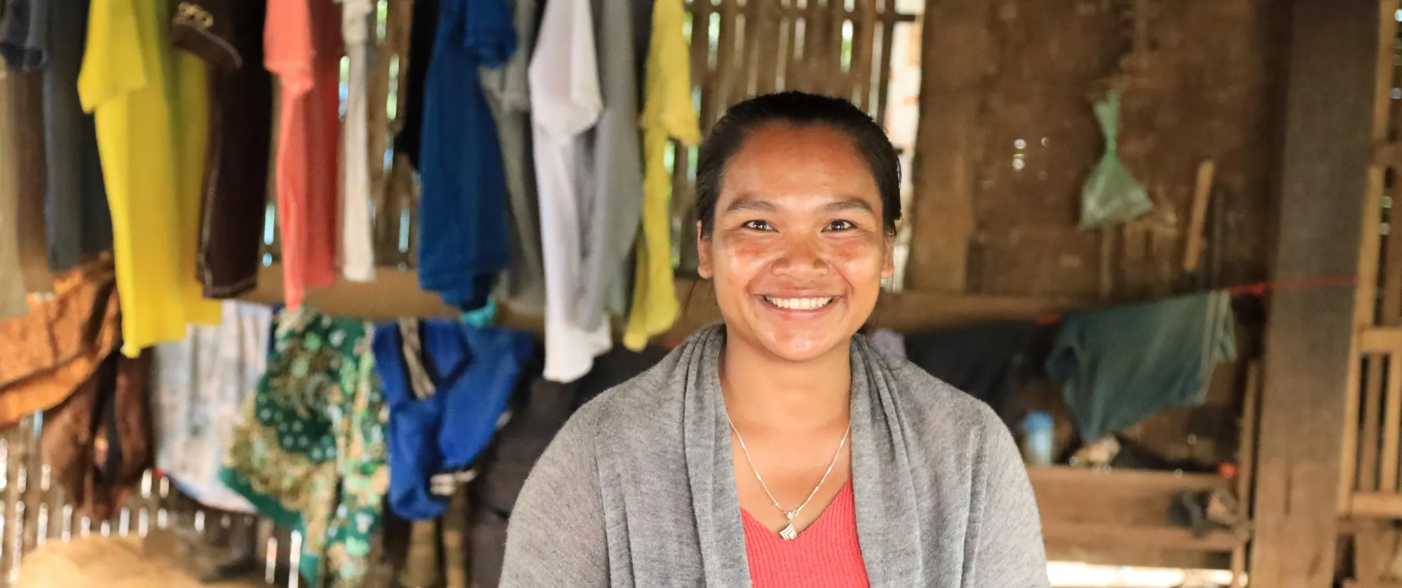 A woman smiles. 
