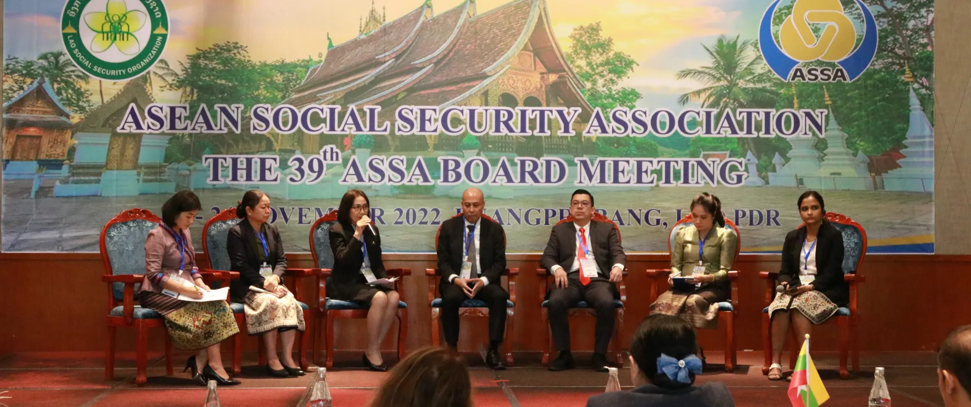 Panellists sitting on the stage. 
