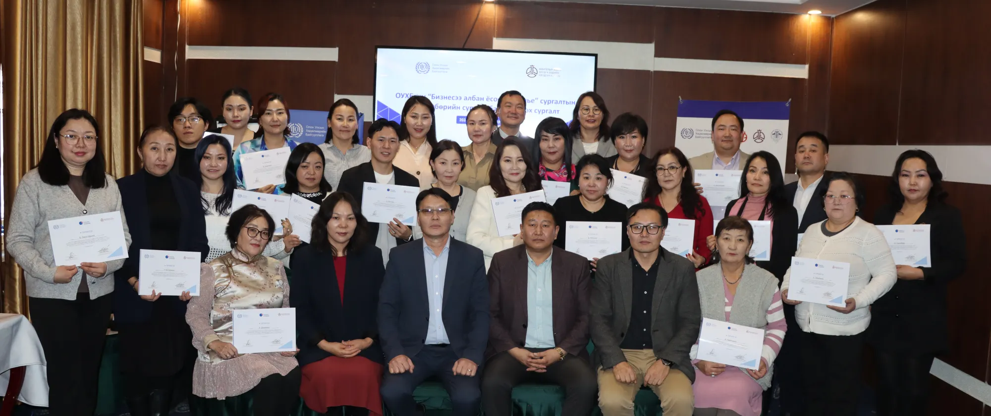 FYB Trainers receiving the certificate
