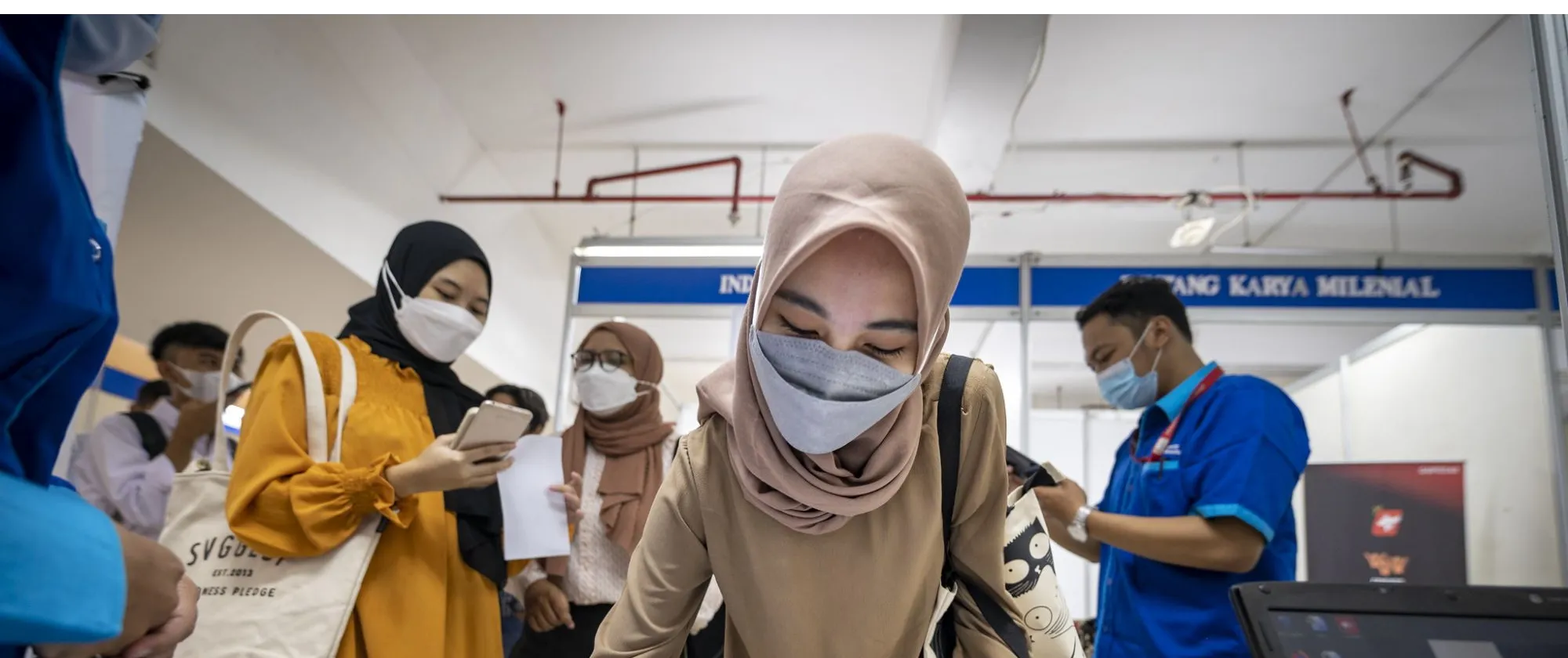 Job fair held in Jakarta. Young people enthusiastically lining up and applying for their dream job