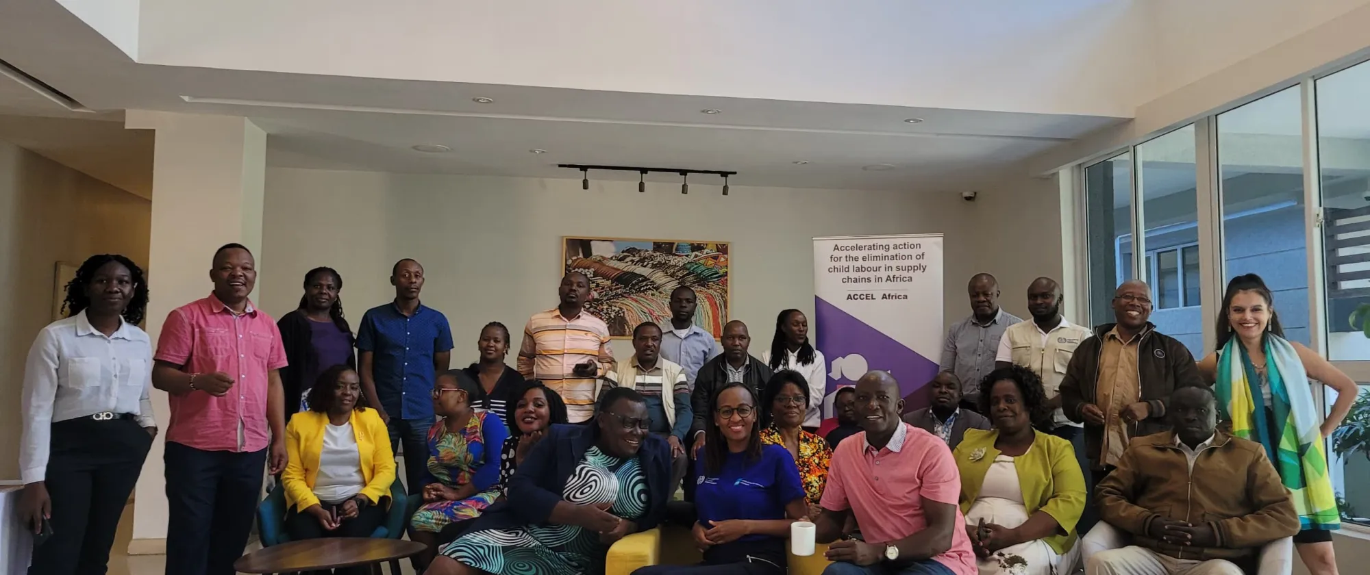 Training participants pose for a picture