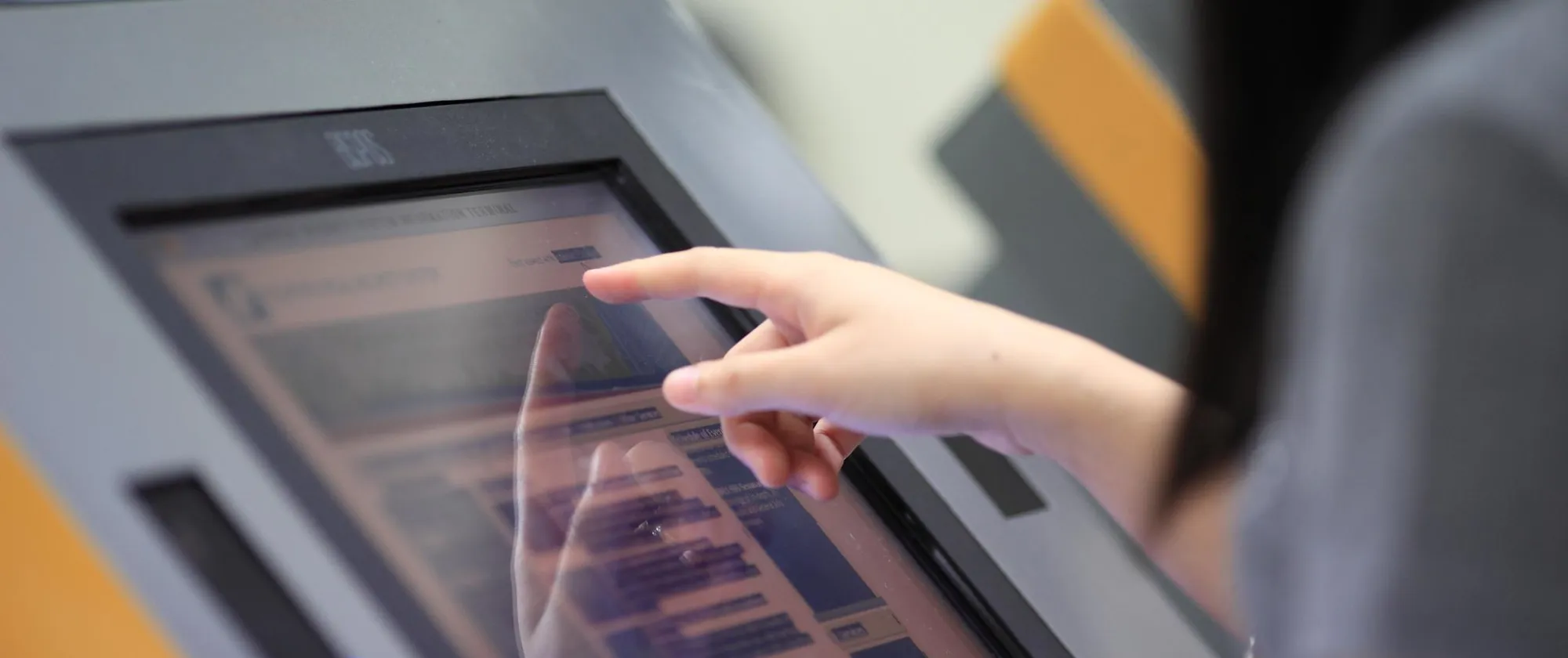 use of touch-screen computer to register and access information