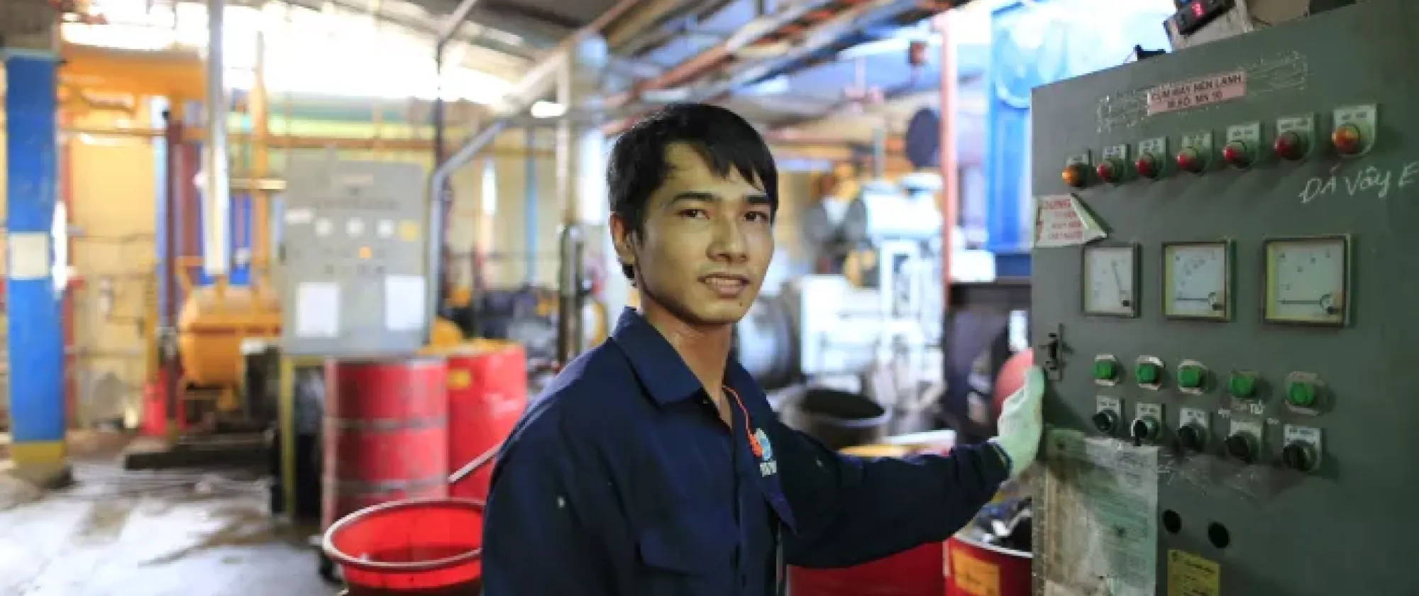 Vietnamese worker at a factory. Factory work is a common job for migrants in Japan