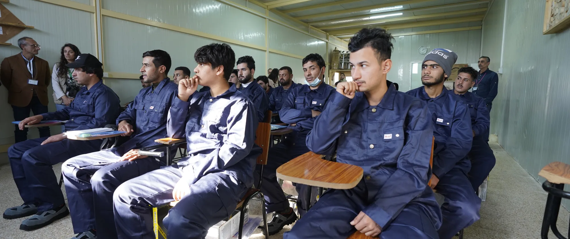 students wearing uniforms at a vocational training centre in Iraq