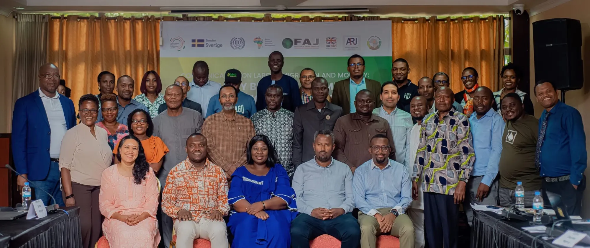 A group of diverse participants at a technical discussion on labor migration and mobility, organized by the ILO and partners.
