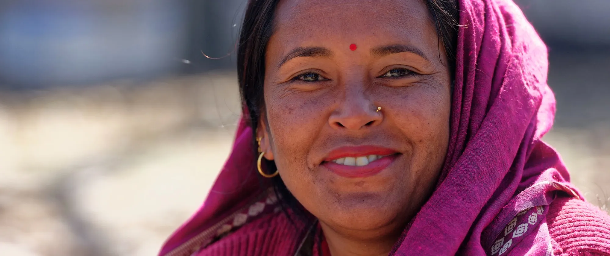 Gita Shrestha, selling refreshments and food outside