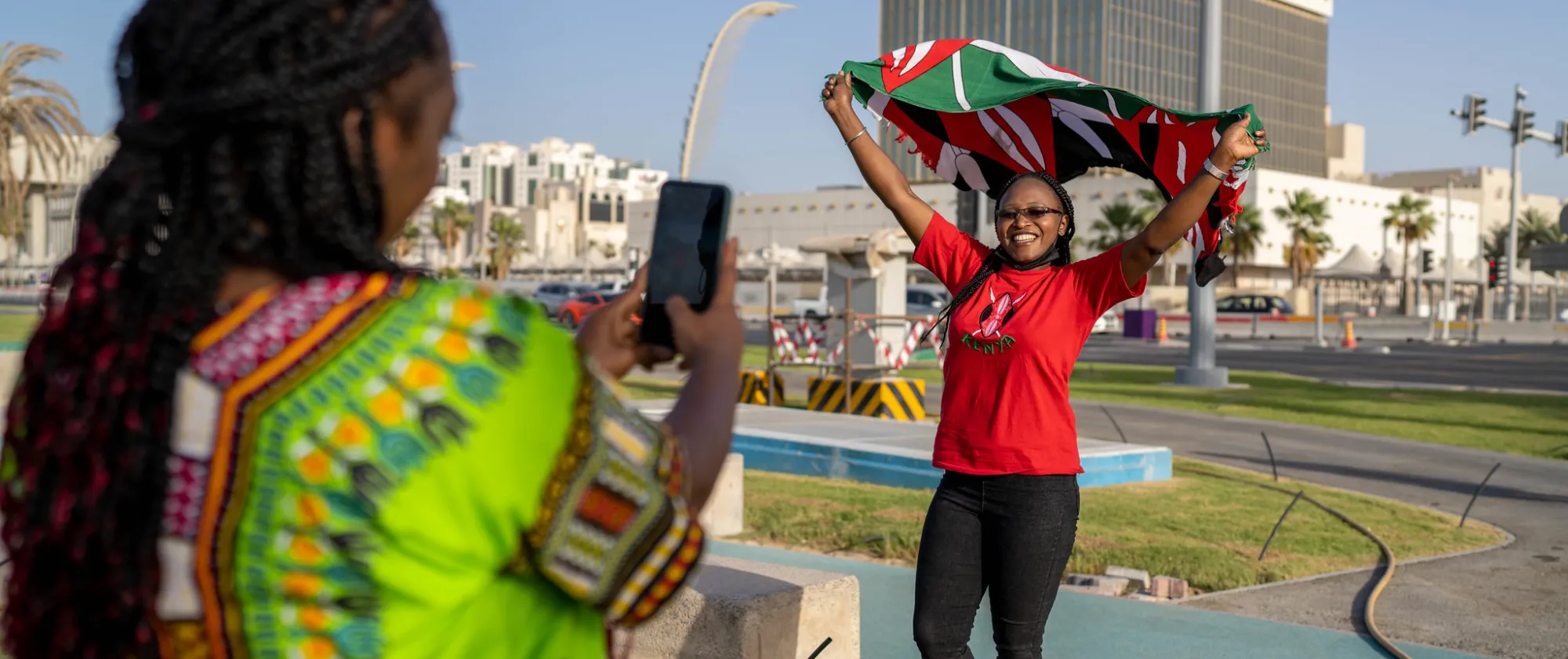 Margaret a migrant worker from Kenya taking a photo during her day off. Qatar 2022