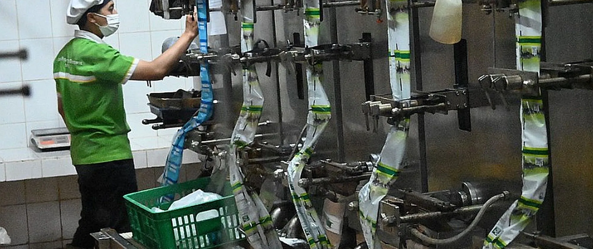A person working on the machine in front of him