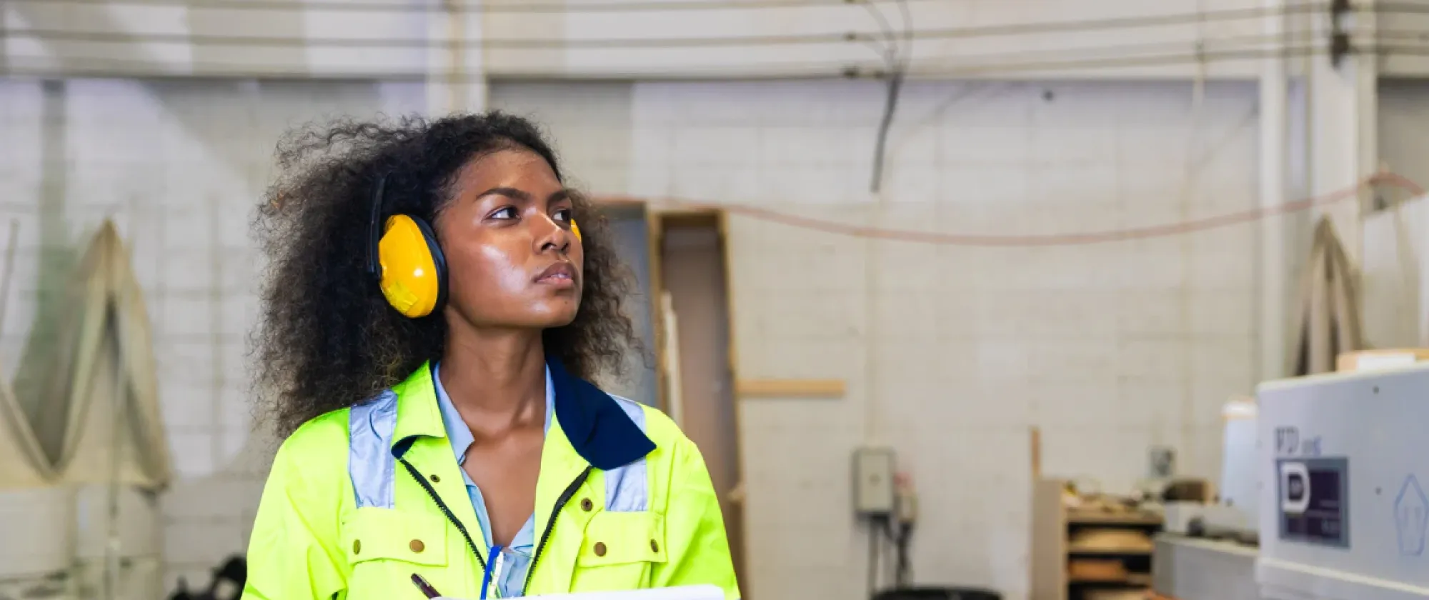 Women manager safety officer inspector work safety checking in factory industry