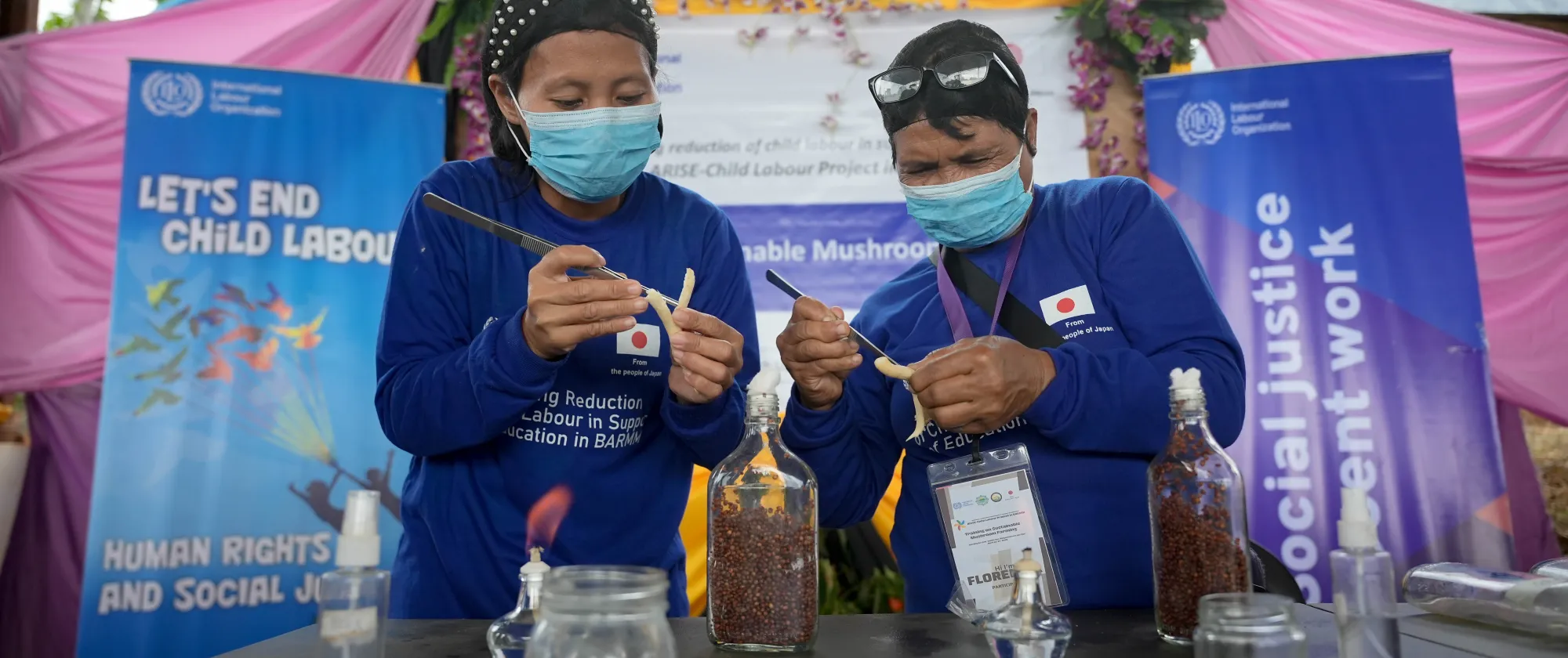 two women doing a mushroom culture