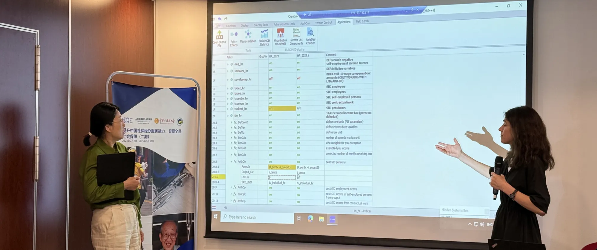 The trainer explains the model to the trainee, Beijing, China, April 2025