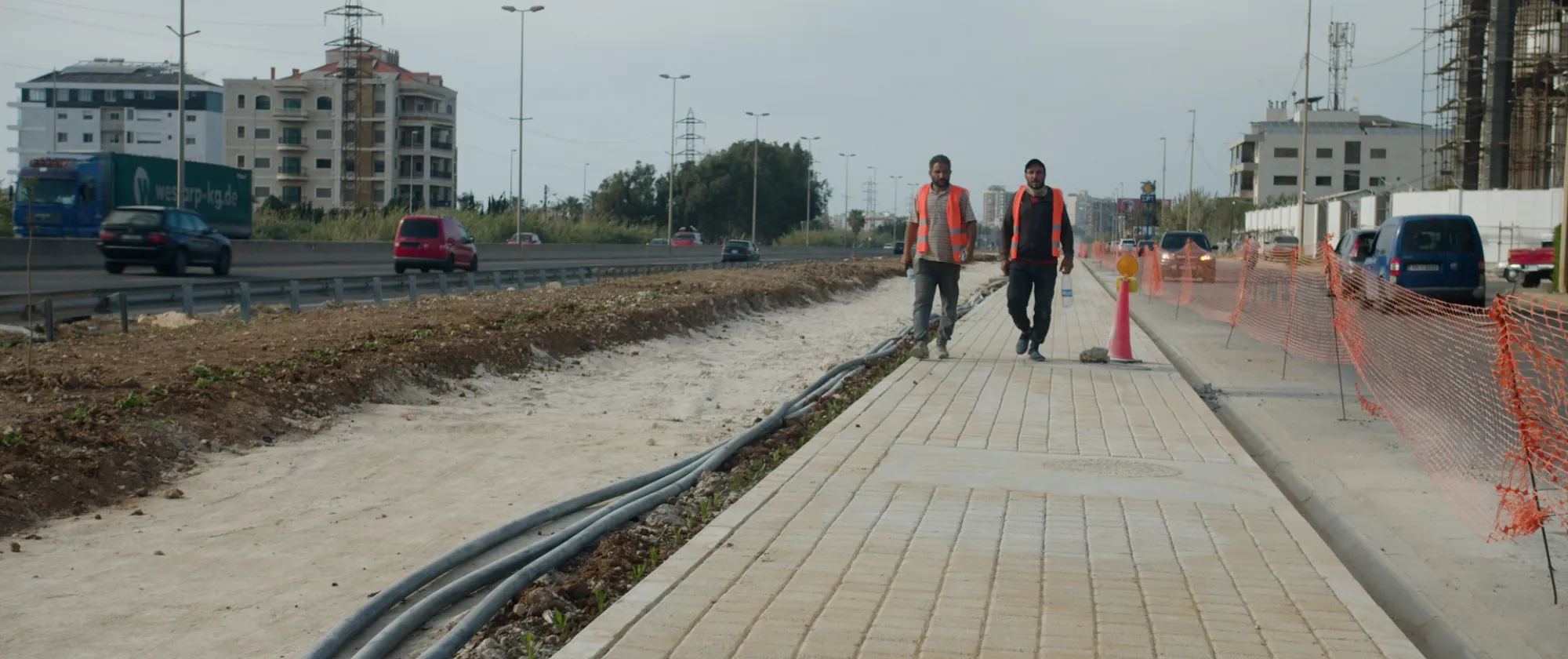 Workers on-site at the EIIP Tripoli Pedestrian Network.