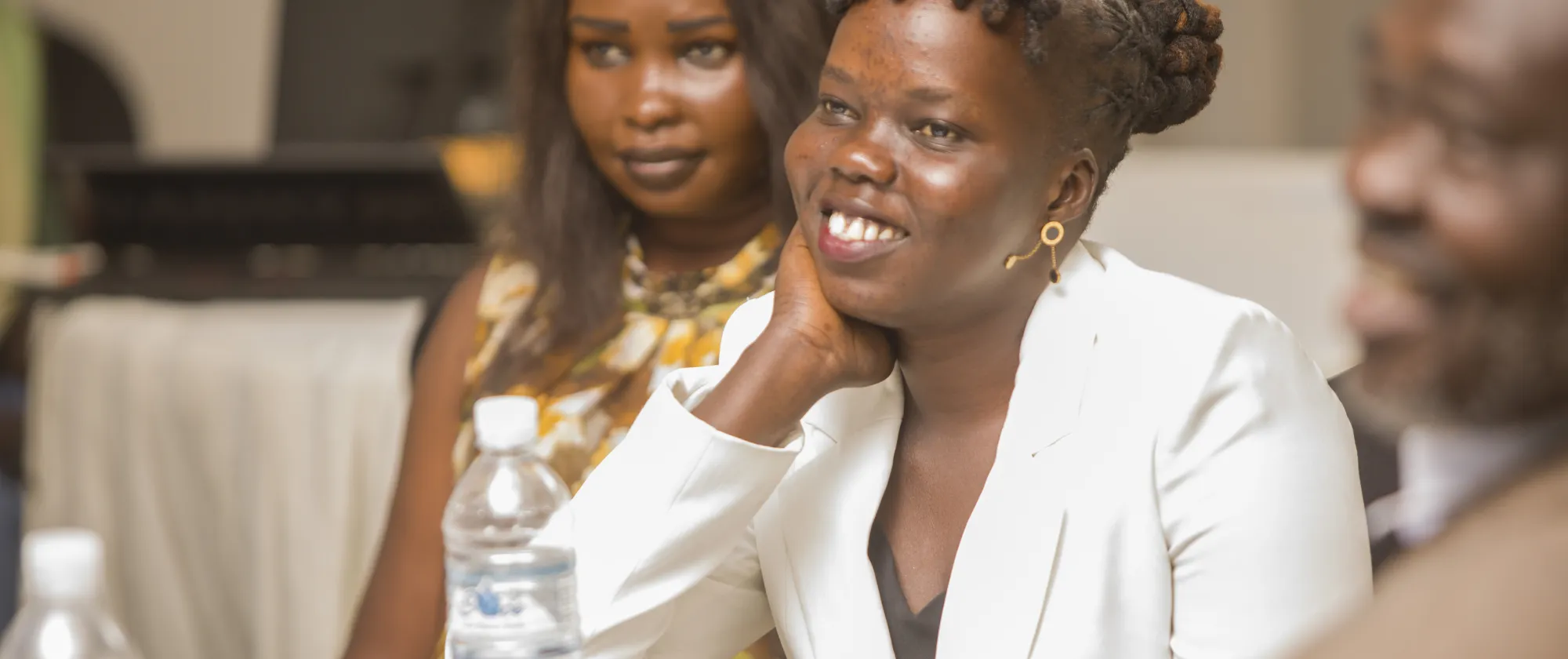 A female participant smiling at the camera