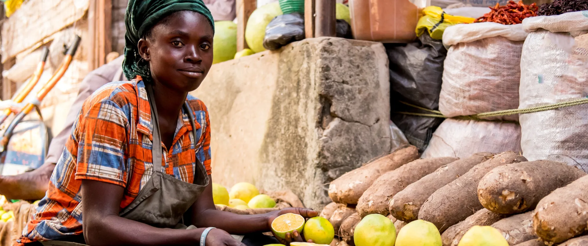Young woman seller in a market