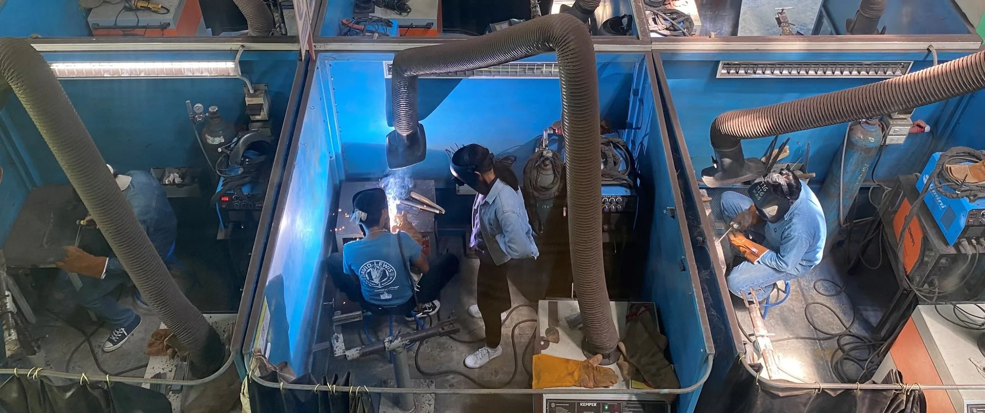 Workers at a metal and electrical training course.