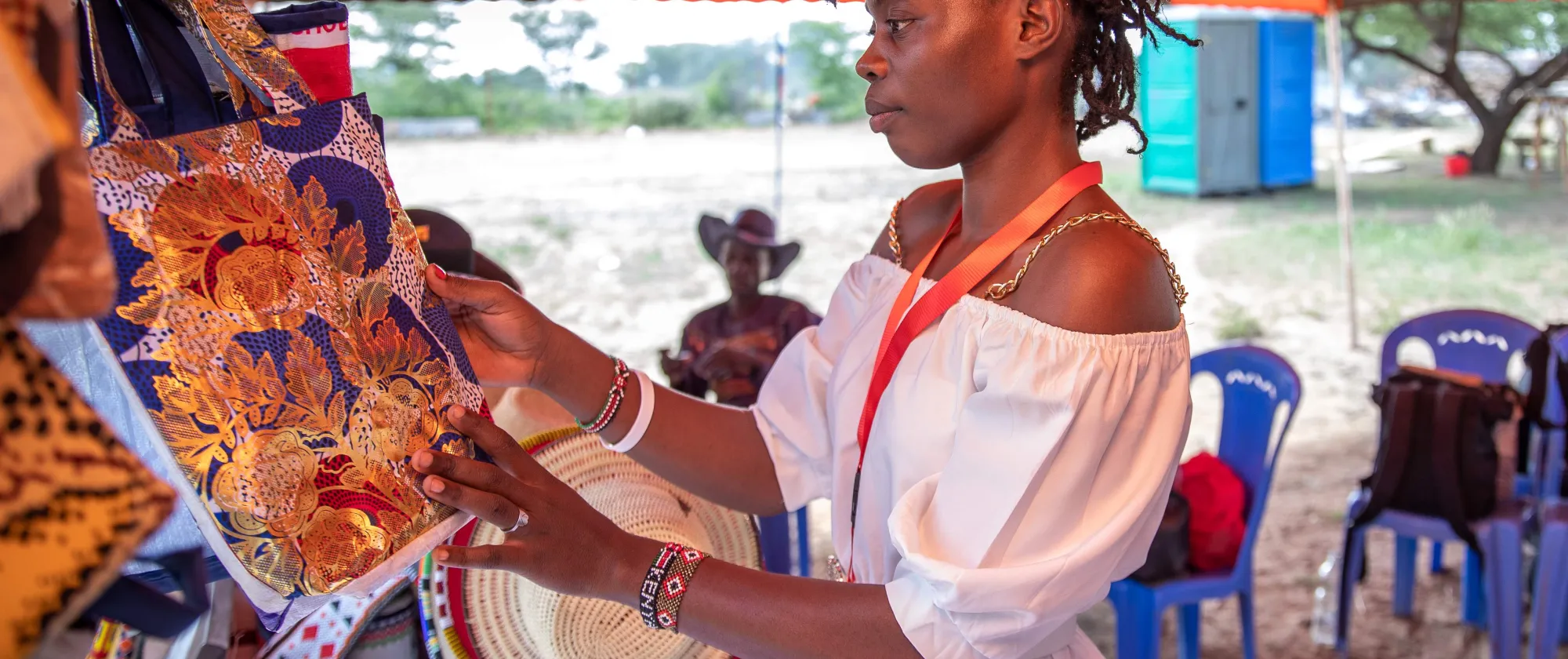 A female entrepreneur showcasing her wares