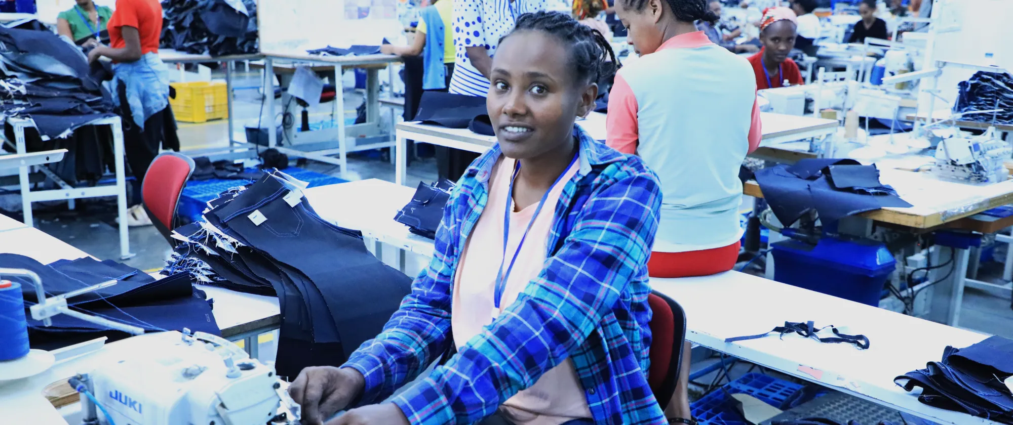 A woman worker at a sewing machine