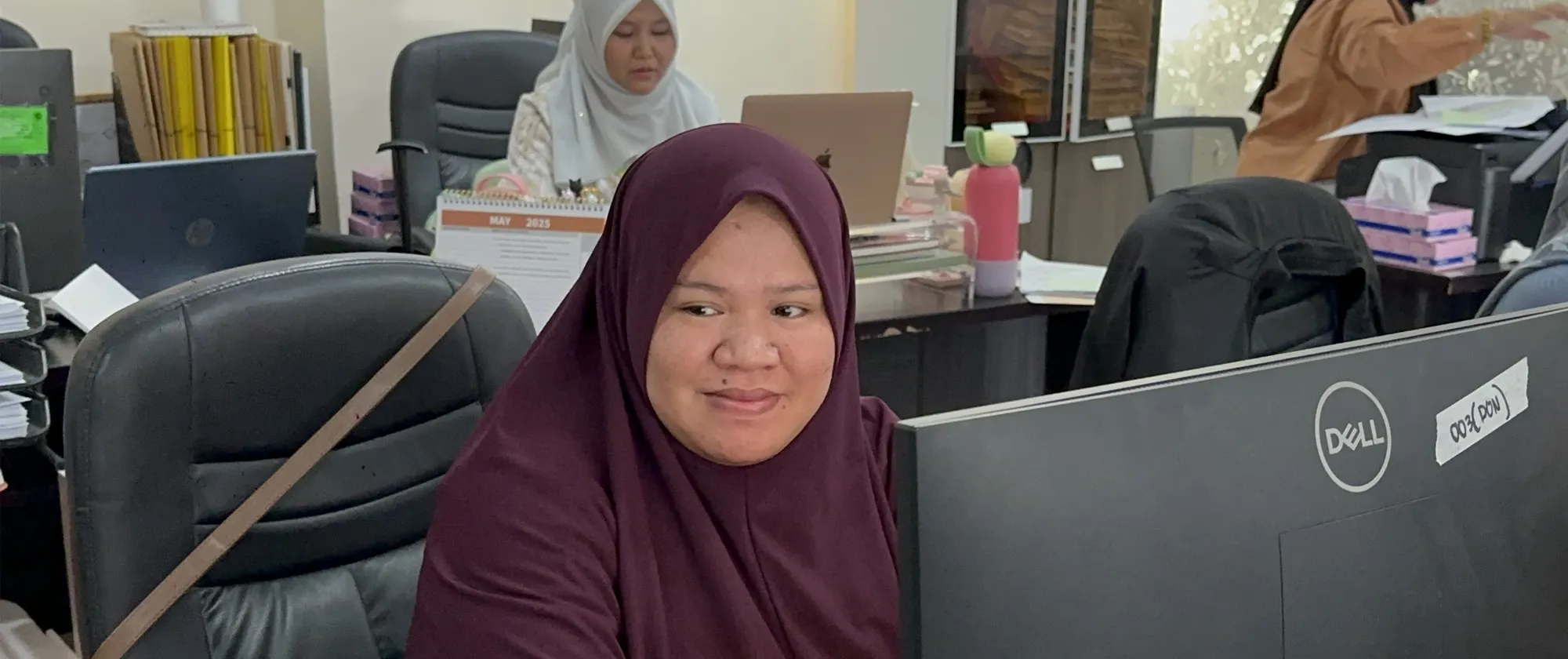women wearing hijab in a government office