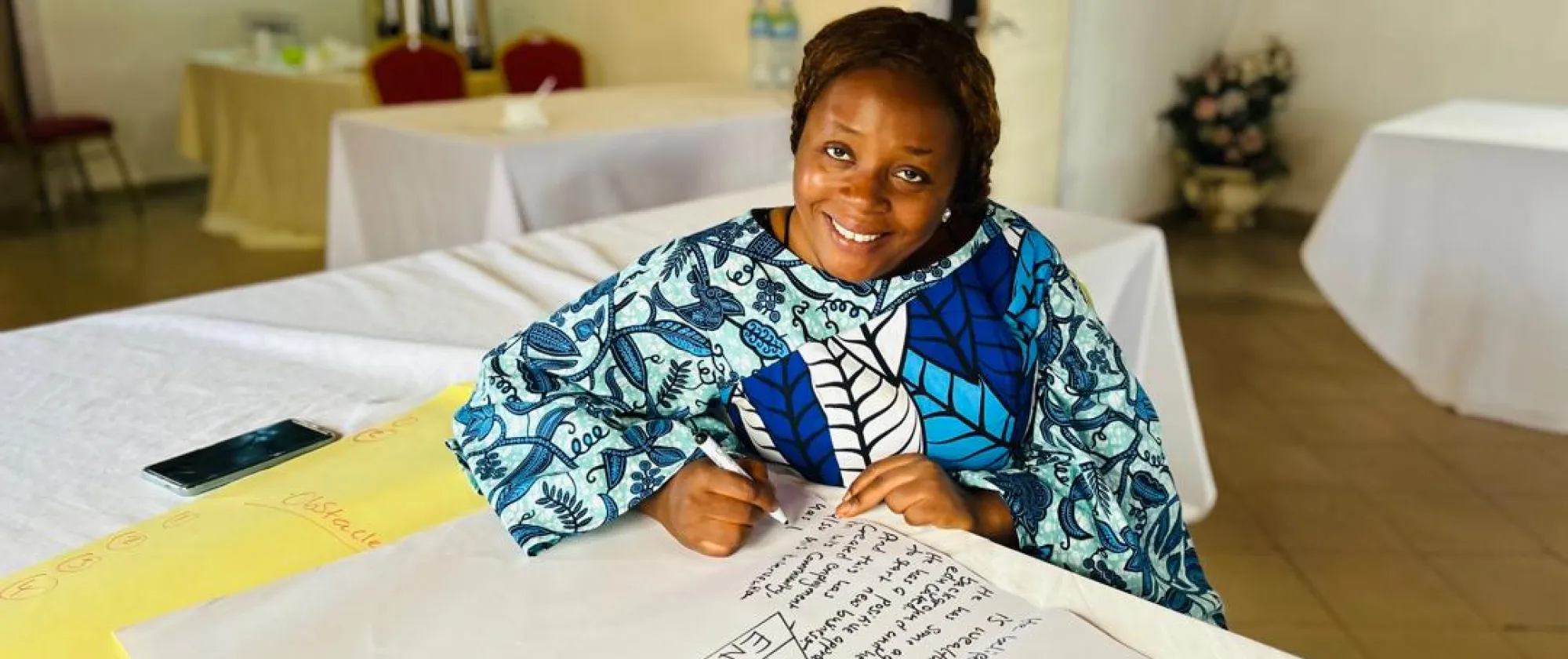 Mary Alpha prepares a workshop for Farm Tok Consultancy.