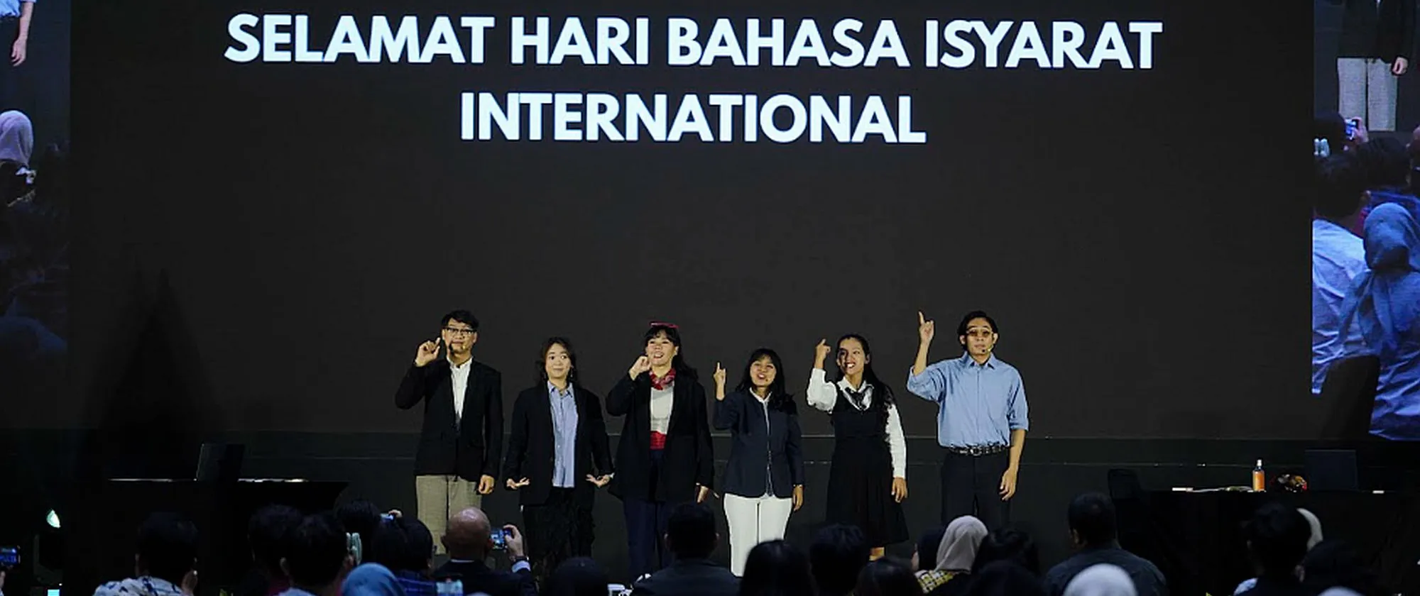 Five people standing