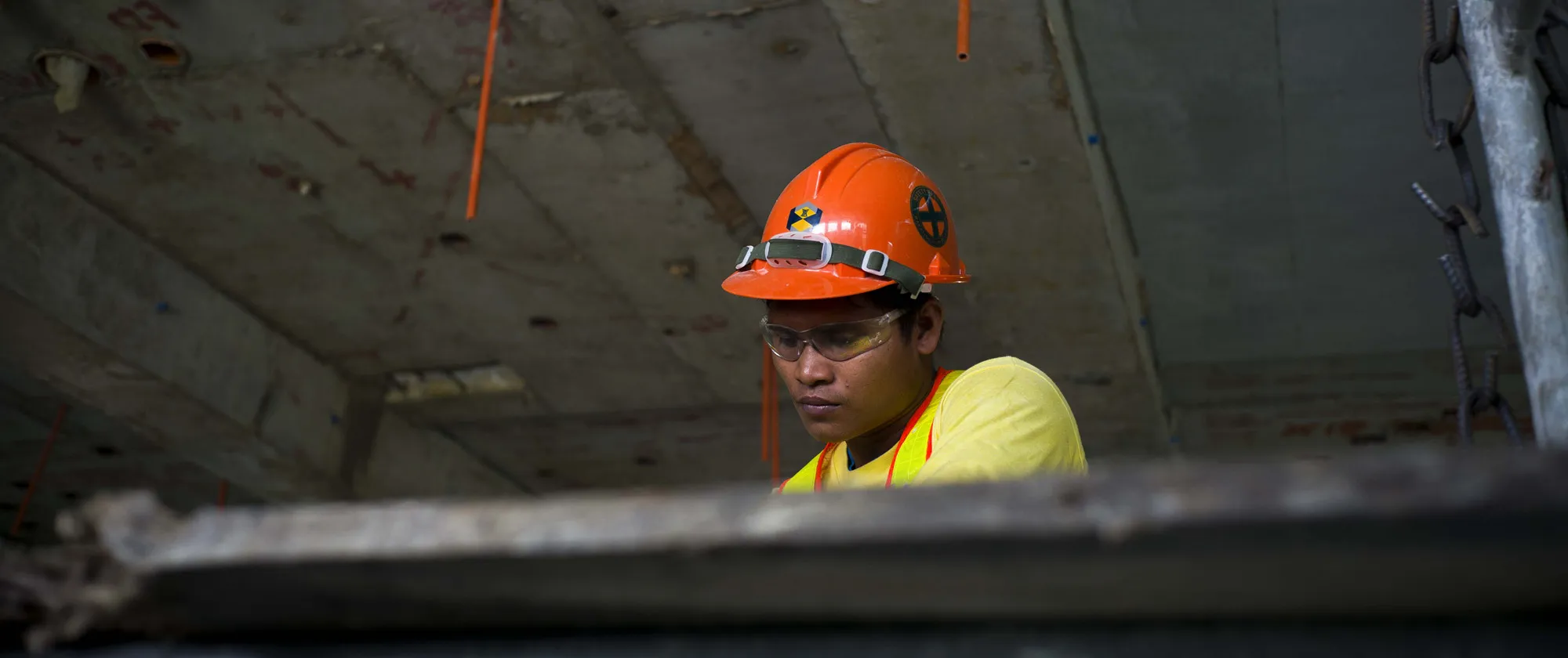 construction worker in yellow shirt and hard hat