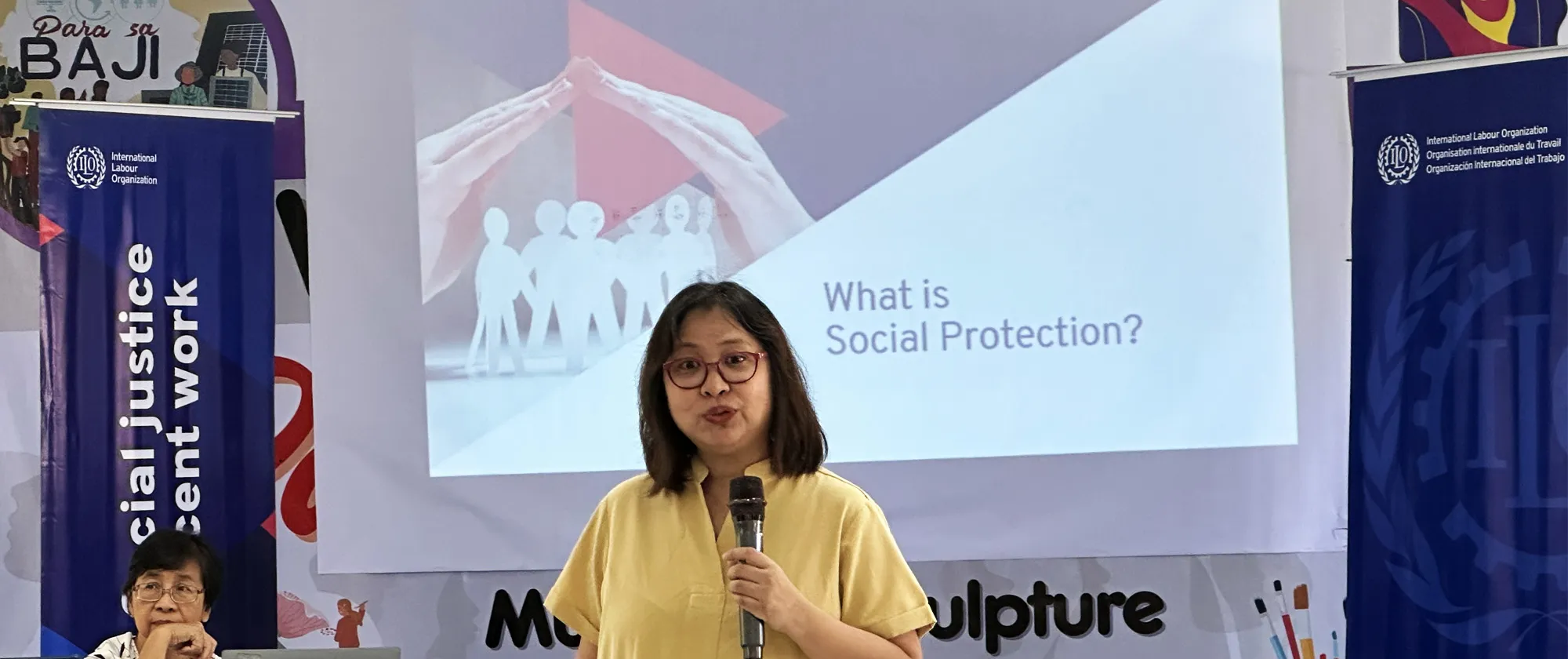 a trainer presents about social protection