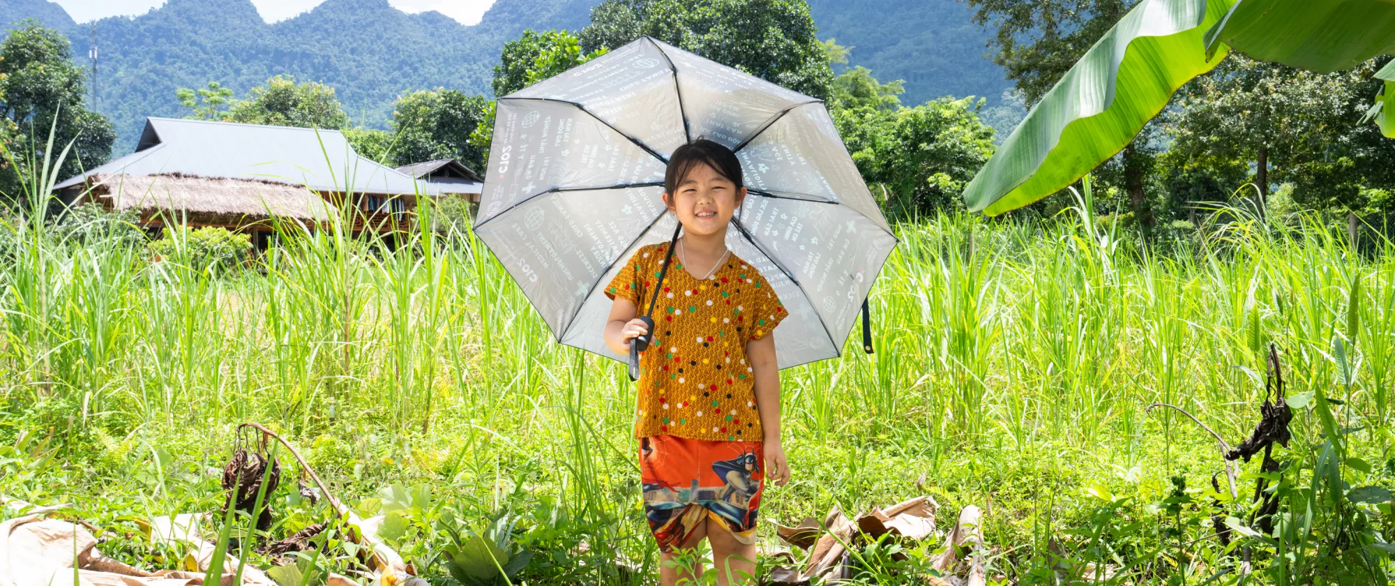 A girl stands in a rice field in Ha Giang province, Viet Nam