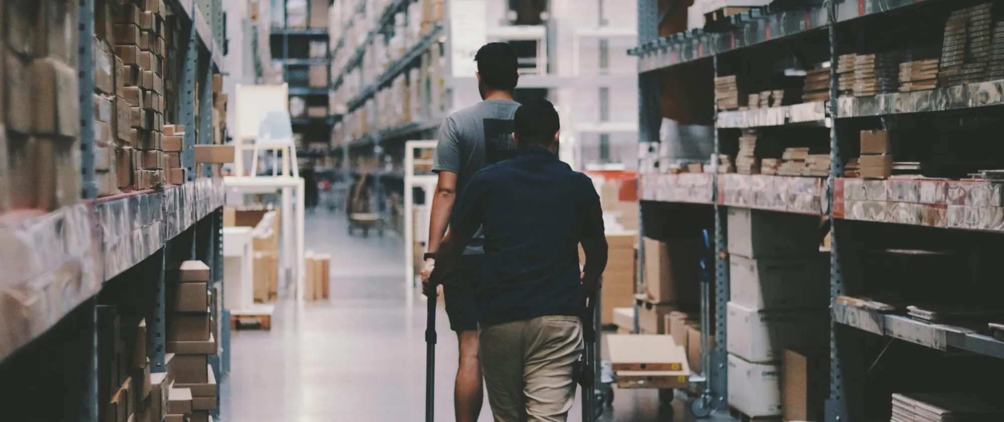 Men Going Around a Warehouse
