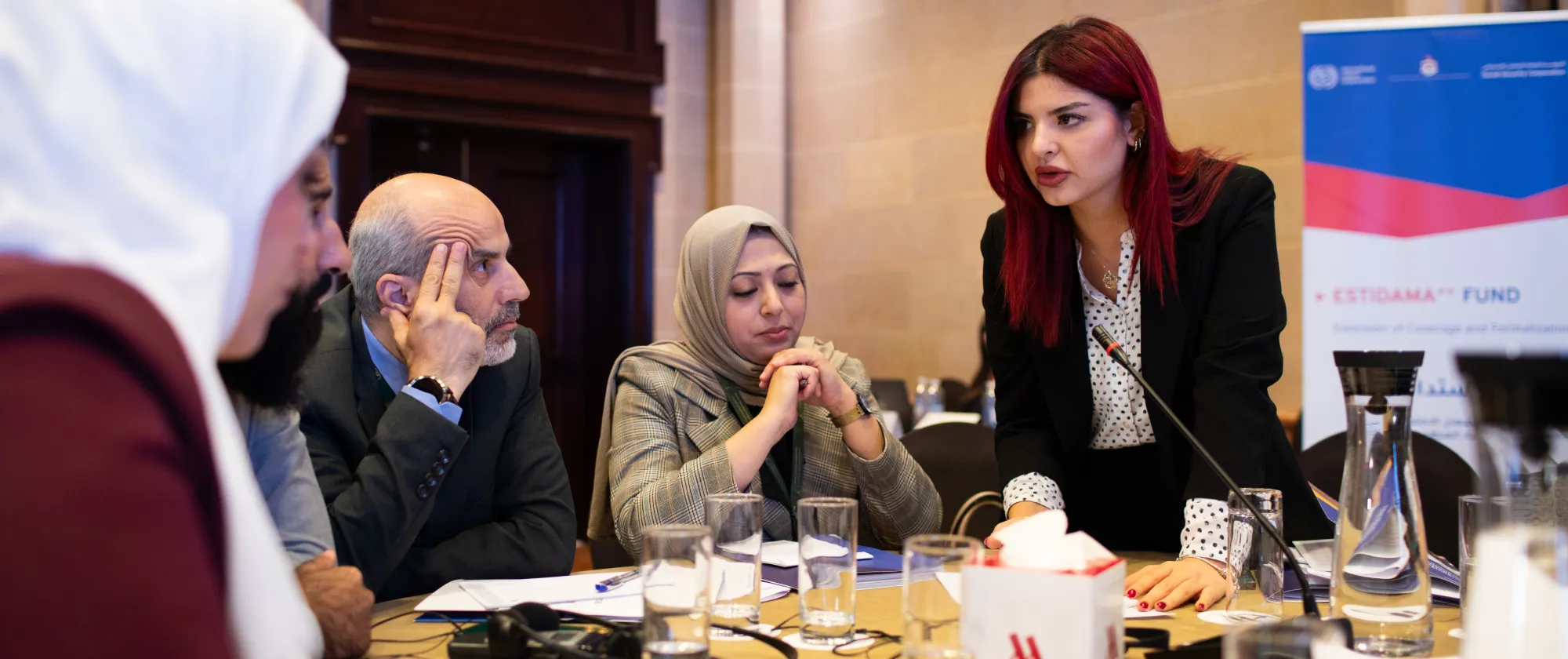 Participants exchange ideas during group discussions