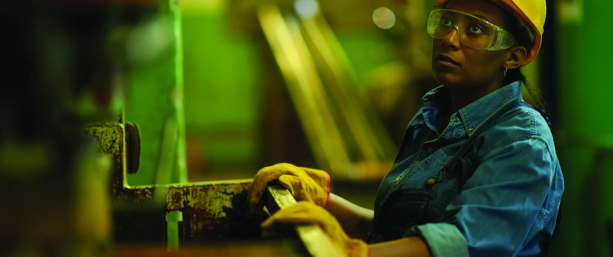 Young woman working at a construction site in Sri Lanka.May 19, 2015