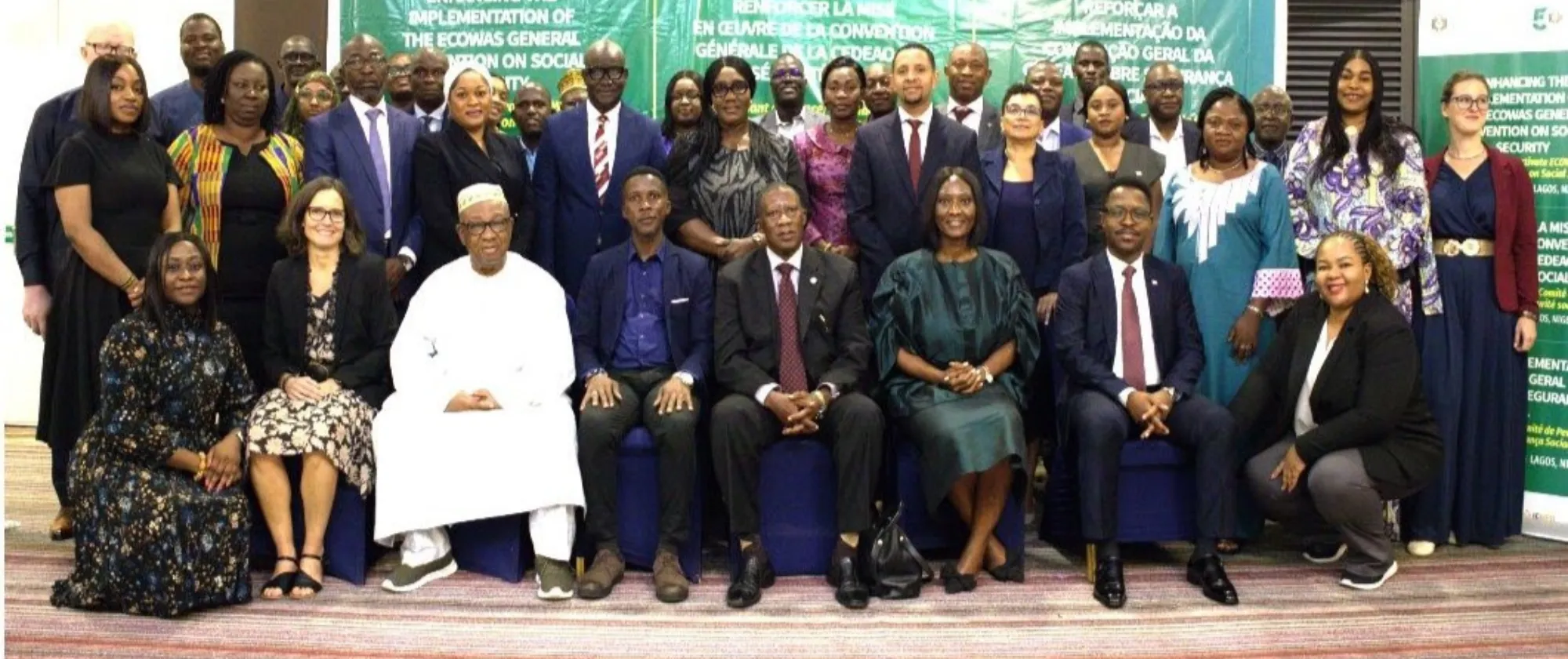A group of delegates is gathered for a formal photo during the ECOWAS-ILO meeting in Lagos, Nigeria.