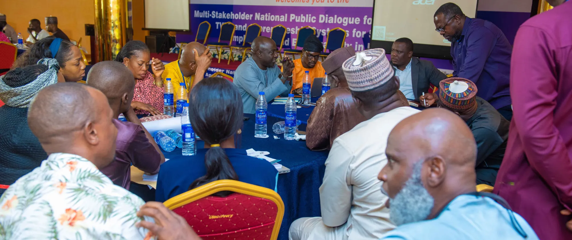 A group of participants engaged in a roundtable discussion during the Multi-Stakeholder National Public Dialogue on Skills Development in Abuja.