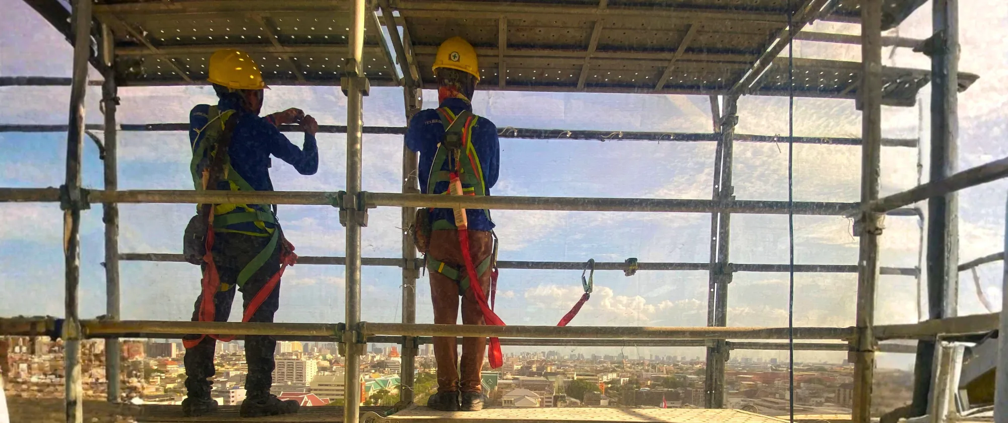 Construction workers at United Nations Building, Bangkok, Thailand.