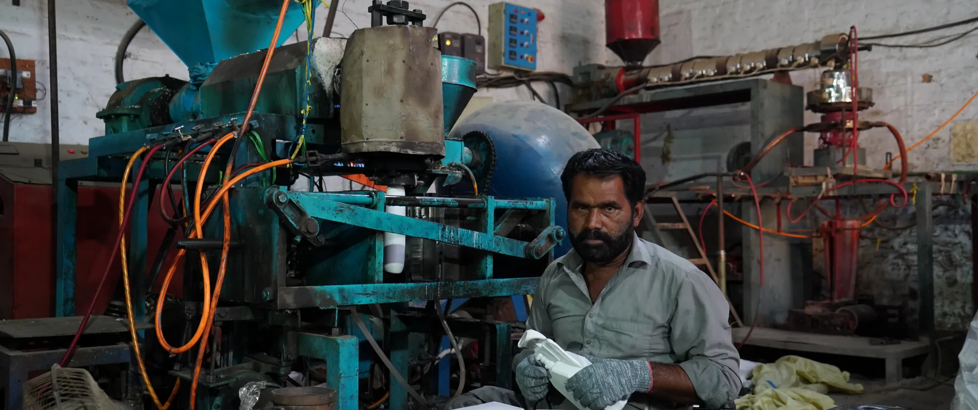 worker at the plastic supply chain factory