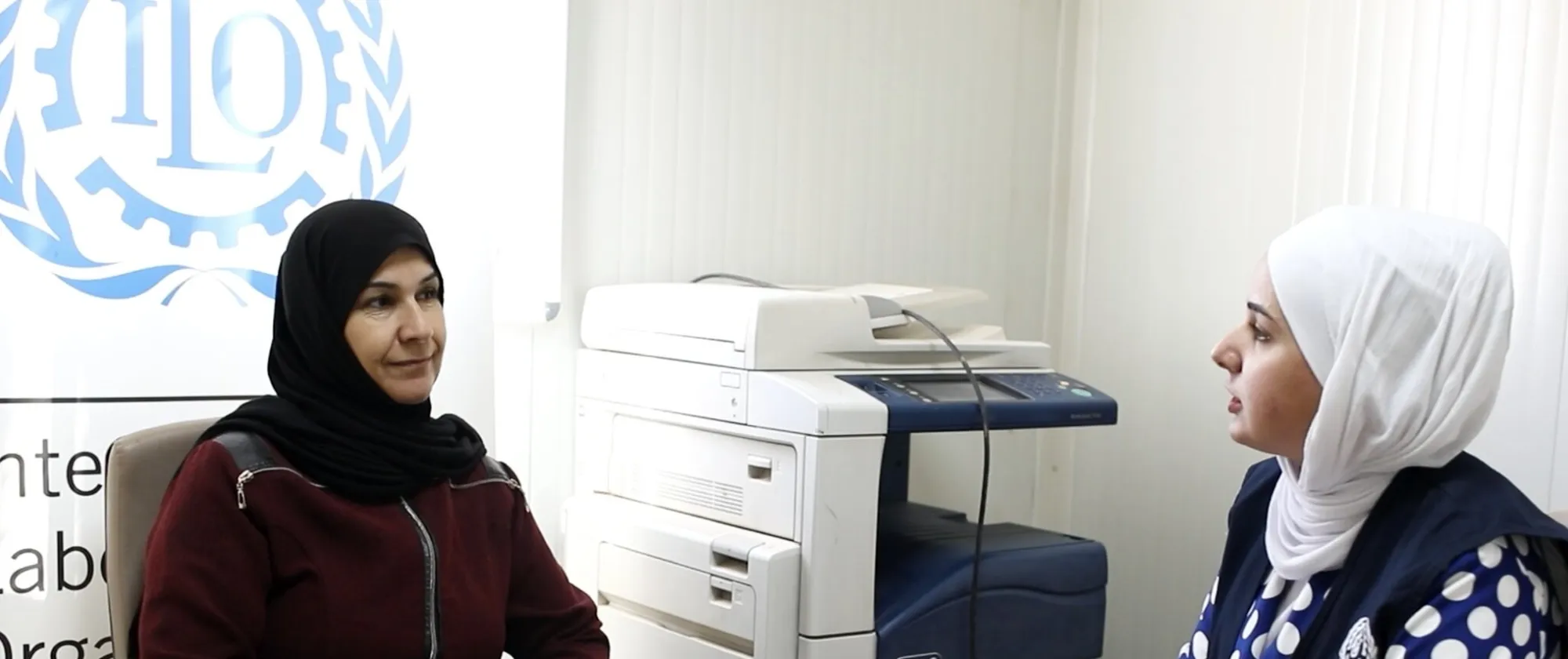 Women talking in the Employment Office @ILO-run Za'atari camp for Syrian refugees