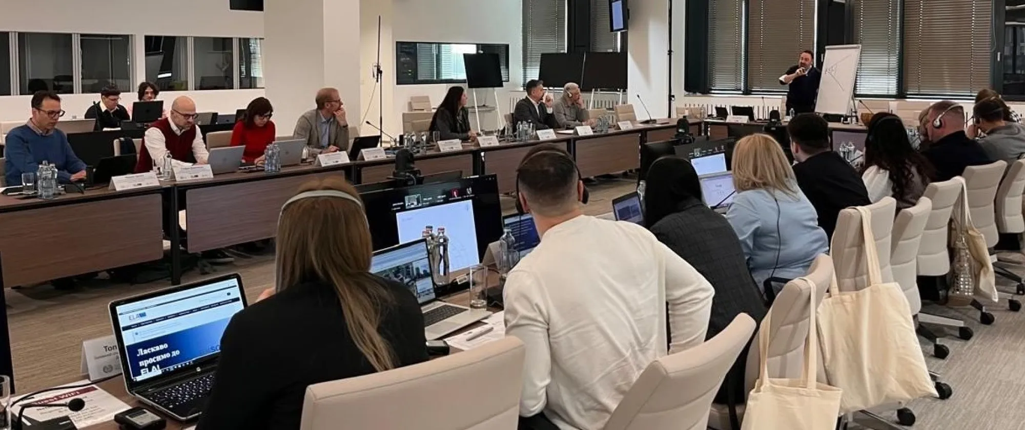 Training participants around a table